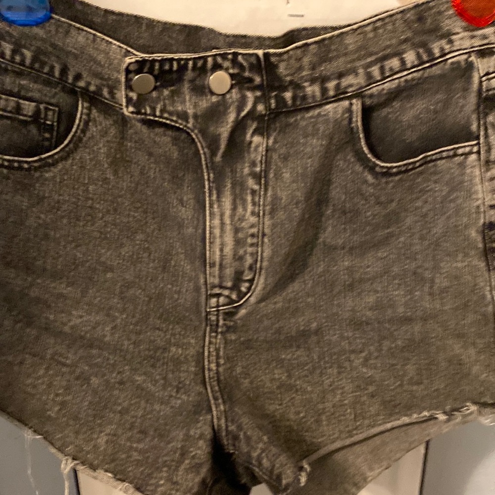 Woman’s greyscale jean high rise shorts. Size 9/10